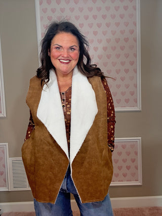 Collins suede vest with sherpa lining for women featuring a soft suede exterior and cozy sherpa interior, perfect for layering and women’s clothing styles.