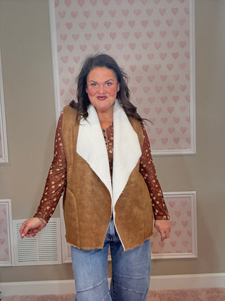 Collins suede vest with sherpa lining for women featuring a soft suede exterior and cozy sherpa interior, perfect for layering and women’s clothing styles.