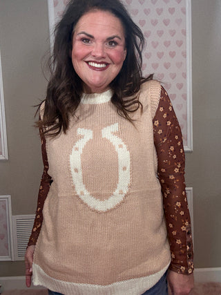 Beige High Class Country sweater vest for women featuring a knit horseshoe design and functional side buttons, a flattering layering piece for women’s clothing, trendy clothes, comfy mom style, and chic mom-approved looks.
