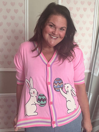 Hoppy Easter short sleeve cardigan with pink base, bunny and Easter egg pattern, pastel trim, women’s spring fashion