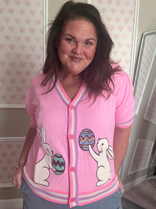 Hoppy Easter short sleeve cardigan with pink base, bunny and Easter egg pattern, pastel trim, women’s spring fashion