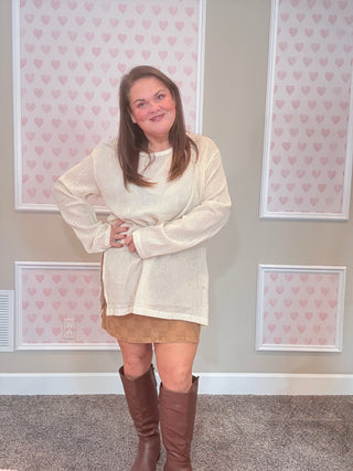 Lightweight cotton mesh top with slouchy oversized fit, tunic length, wide boatneck, and side slits — breathable, airy, and perfect for layering.