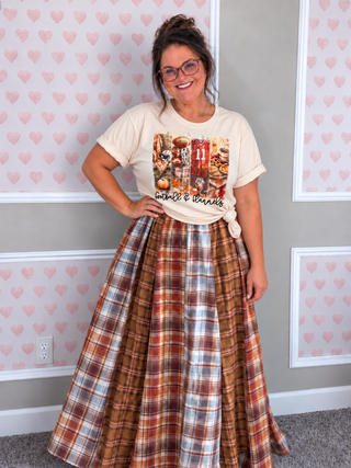 Blakeley Ashford Plaid Maxi Dress featuring warm autumn patchwork plaid, flattering square neckline, adjustable tie straps, smocked back, and flowy full-length skirt, available in women's sizes S/M–3X.
