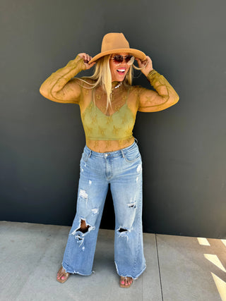 Roxy Lace Top styled with accessories for a chic, feminine outfit perfect for day-to-night wear.