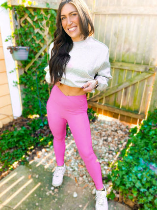 Woman wearing the Molly Max Sculpt Diagonal Ribbed Leggings, styled for a chic, comfortable look.