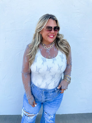 Roxy Lace Top styled with accessories for a chic, feminine outfit perfect for day-to-night wear.