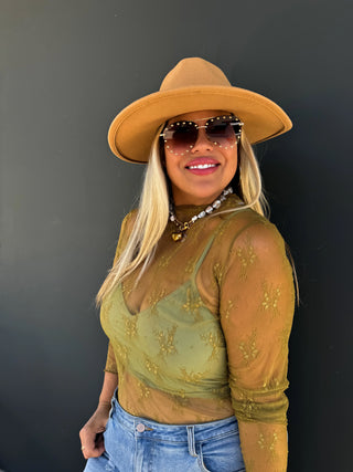 Roxy Lace Top styled with accessories for a chic, feminine outfit perfect for day-to-night wear.