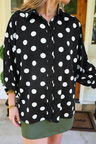 Jess Lea oversized black and white polka dot button-up blouse with lightweight textured fabric and relaxed fit.