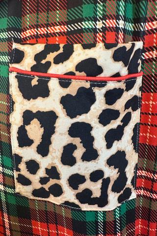 Closeup of leopard pocket on safari pajama set. 