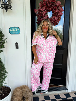 Boo-Jee Pajama Luxe Set featuring a short-sleeve button up top and full-length pants with contrast stripe trim and collar. the fabric is soft, stretchy, and comfortable, designed for lounging in style. 