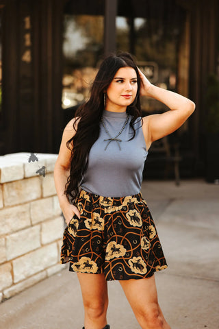 Western-inspired flowy shorts in a bold new print, featuring soft stretchy fabric and elastic back waistband for a relaxed, flattering fit.