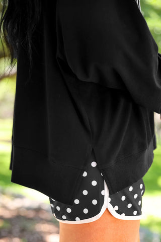 Women's Game Day French terry pullover with mixed polka dot and gingham lettering, V-neckline, and relaxed fit.