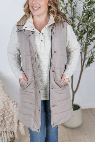 Model wearing the Harlow Long Vest in latte over cream pullover, styled for a casual fall look.