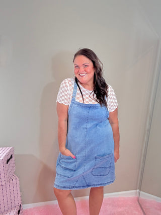 Jenna Jumper Dress - Stretchy Denim with Adjustable Straps – Lightweight denim jumper dress with oversized front pockets and adjustable straps, perfect for layering.