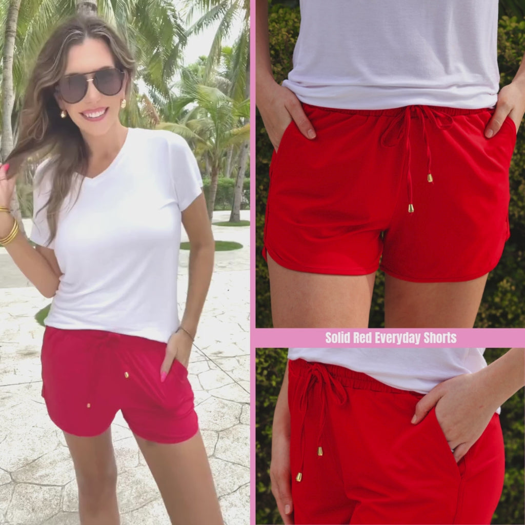 Solid red mid-rise everyday shorts with a relaxed fit, drawstring tie waist, and side pockets, styled for casual spring and summer wear.