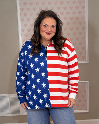 Women’s oversized American flag pullover with stars and stripes print, quarter zip neckline, and cozy relaxed silhouette
