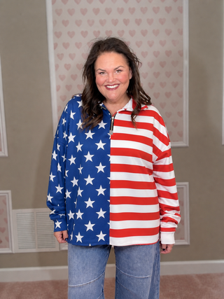 Women’s oversized American flag pullover with stars and stripes print, quarter zip neckline, and cozy relaxed silhouette