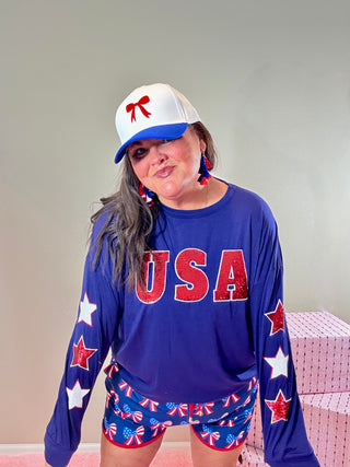 Sequin USA Star Sleeve Top – Stylish top with sequin "USA" lettering and embroidered star outlines on the sleeves, perfect for patriotic style.